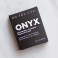 No Tox Life SOLIDSILK ONYX vegan facial cleansing bar 56 g in black packaging