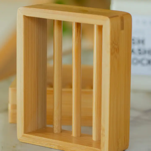 Bamboo soap holder with slatted design, natural wood finish