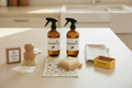 AussieKind Starter Kit on kitchen bench with Dish Block, bamboo holder, and Laundry Detergent Sheets