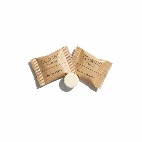 ECOKIND multi-surface and glass mirror cleaning tablets in kraft paper packaging on white background