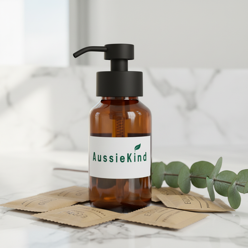 AussieKind amber glass pump bottle with hand soap sachets on marble vanity